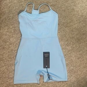 Bo & Tee Serve Scoop Neckline Open Back Unitard in Ice Blue. 
NWT.
NEVER WORN.